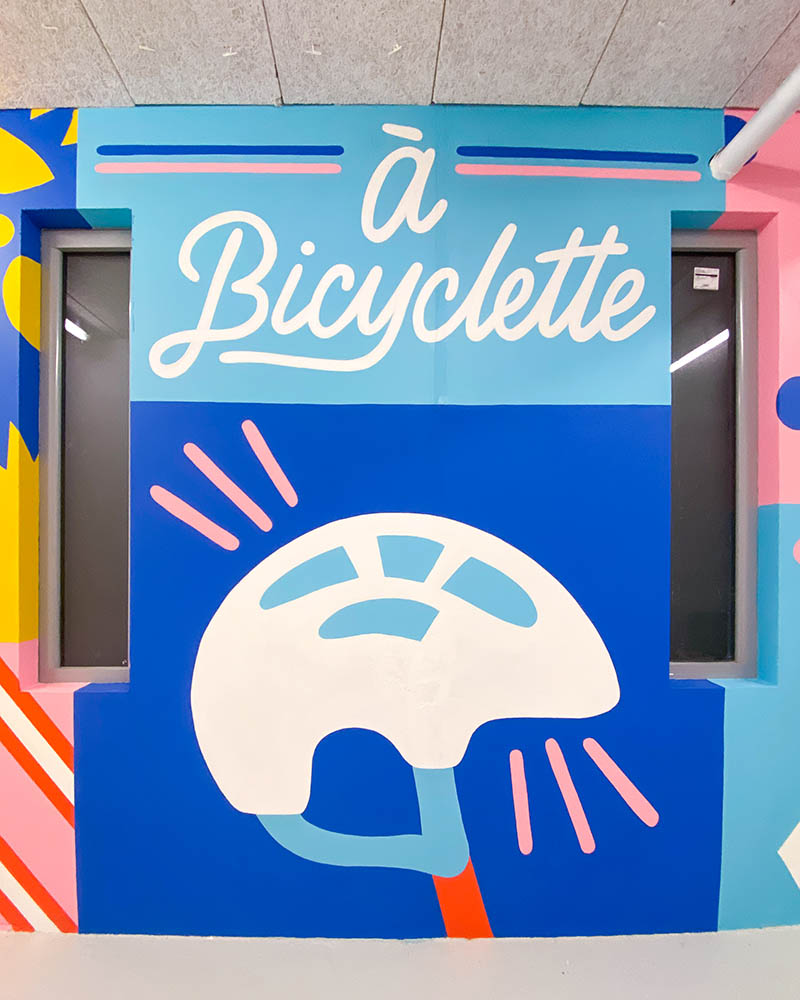 bike themed painted mural colorful
