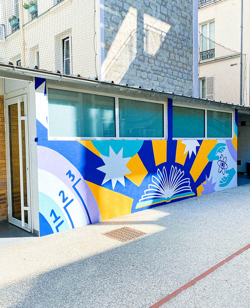 painted colorful mural in school courtyard